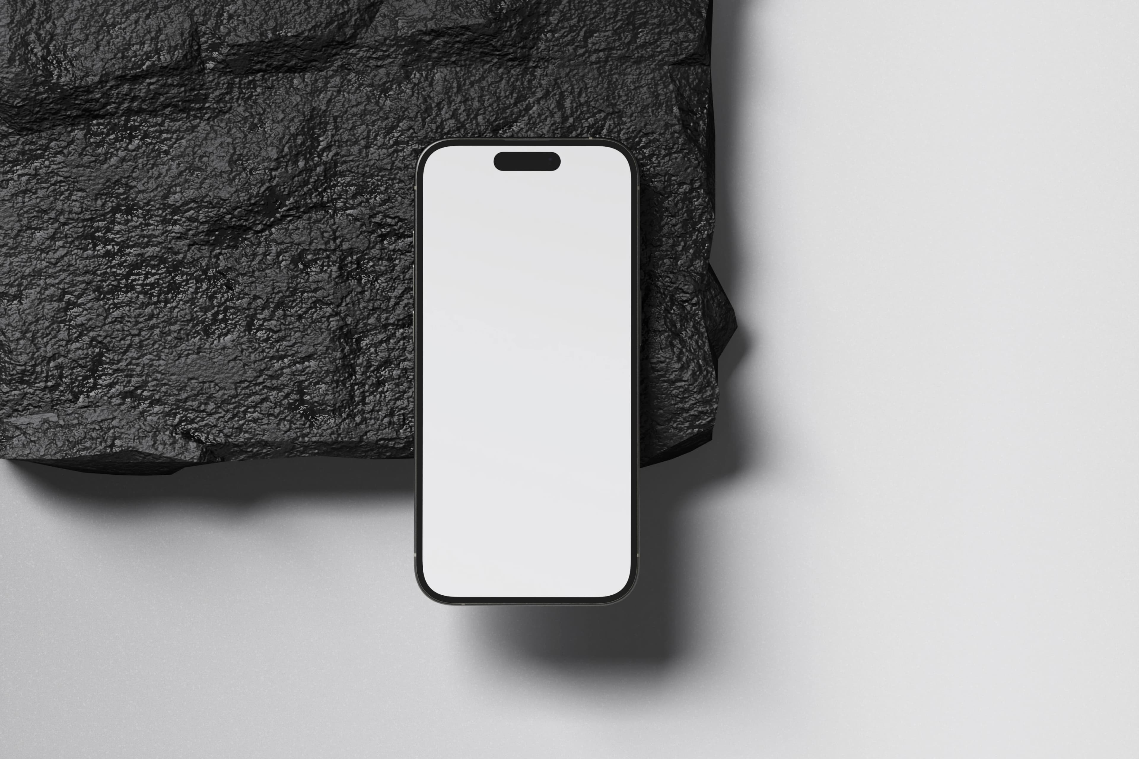 Phone mockup on dark rock